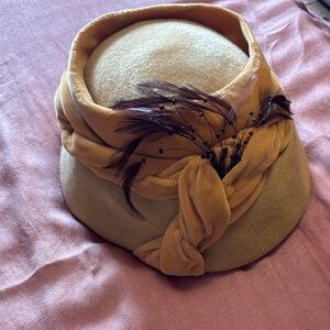 Elegant Mustard Hat with Feather Detail